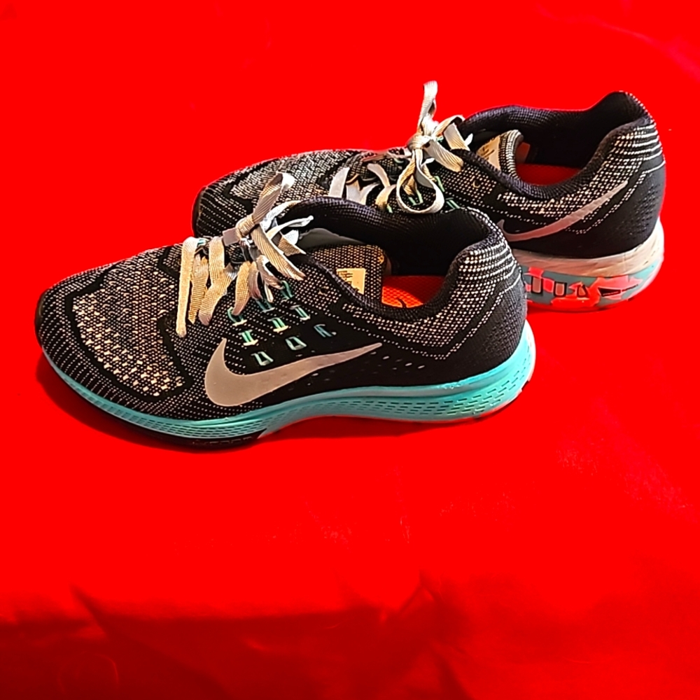 Nike running shoes size 7 black and grey with turquoise trim